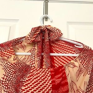 Beautiful top with back open perfect for a party